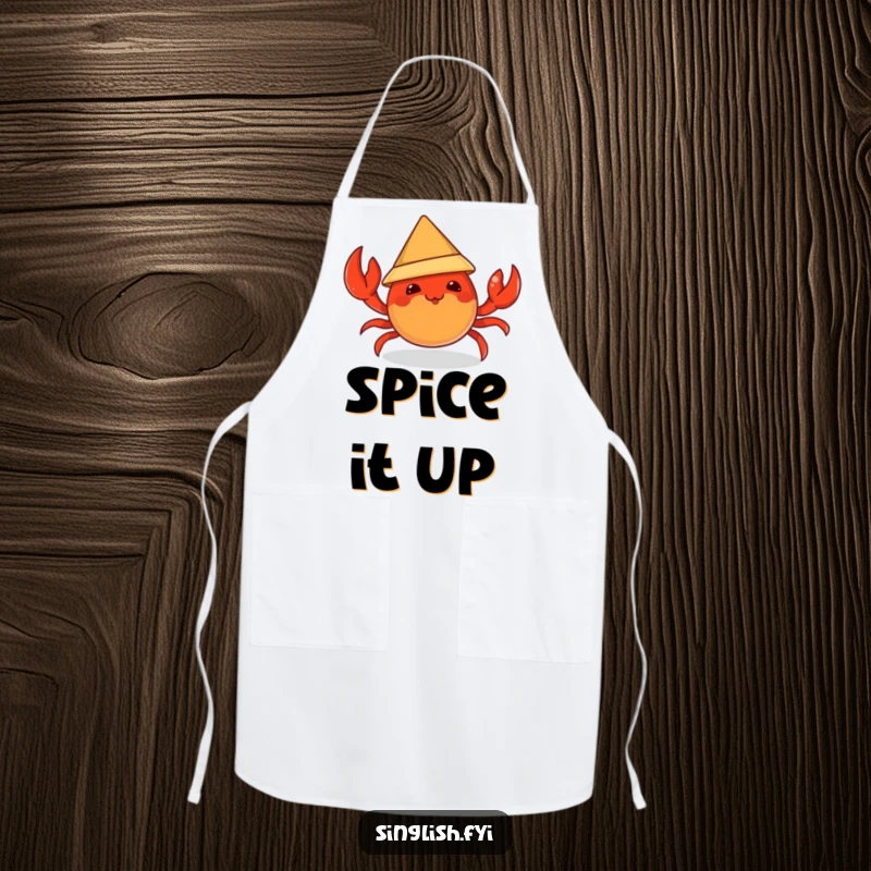 Funny apron featuring a mischievous chili crab character trying to wear a tiny conical hat, ideal for culinary adventures with humor.